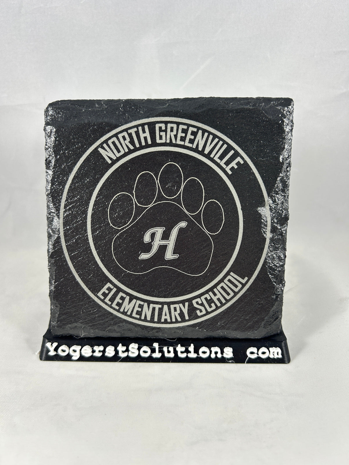 North Greenville Elementary School paw logo engraved on slate with a Yogerst Solutions stand